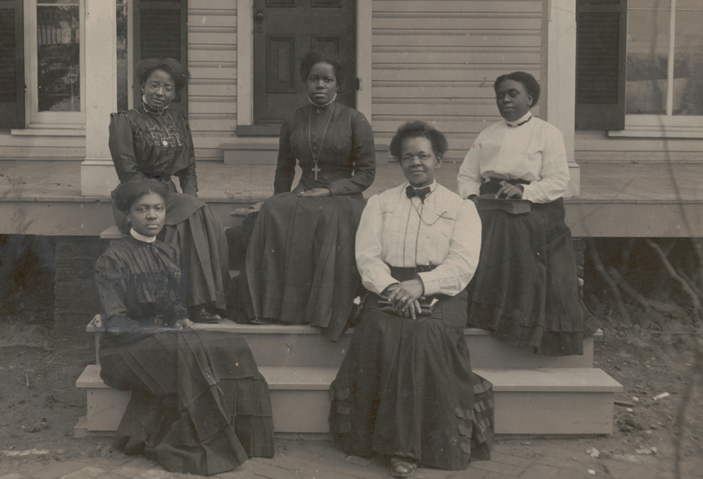 Nannie Helen Burroughs (center) and other women at the National Training School in Washington, D.C. Source: Library of Congress.