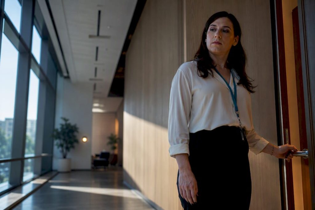 Employee paused outside workplace restroom
