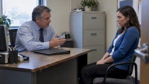 Uncomfortable employee facing a supervisor at work